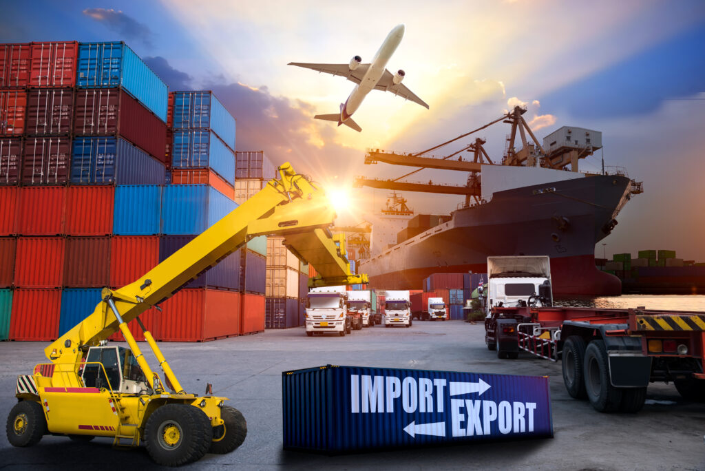 Import Export Collage photo with shipping containers stacked, airplane, container ship, several trucks, and a container forklift yellow in color with sunbeams gleaming through the back of the photo